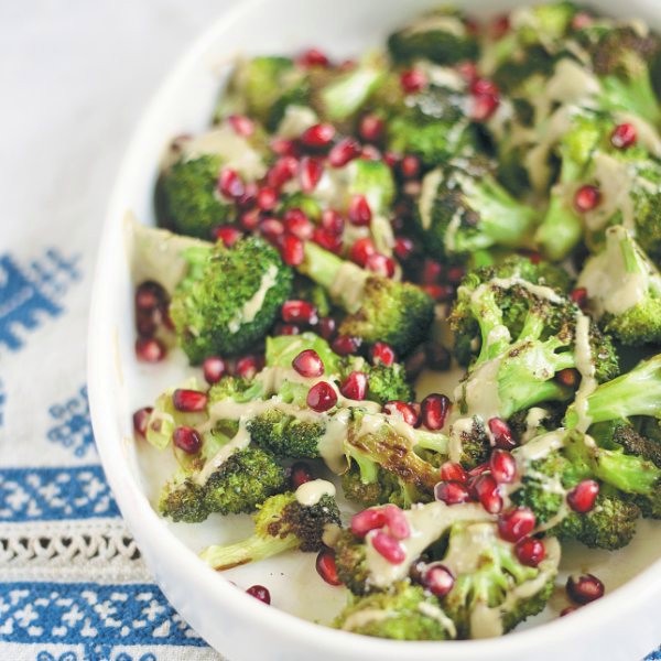 Roasted broccoli with pomegranate and tahini