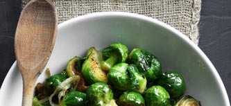Roasted Brussels sprouts with bacon, caramelized onions, and sage