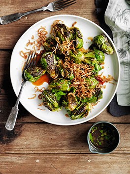 Roasted Brussels sprouts with crisp shallots, sour and salty dressing