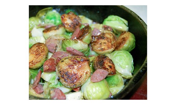 Roasted Brussels sprouts with smoked sausage and shallots (Rosenkohl)