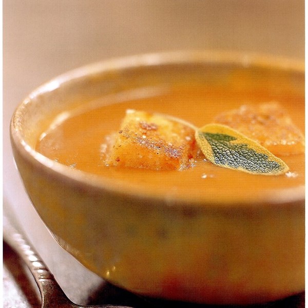 Roasted butternut squash soup with tomatoes, thyme, and corn bread croutons