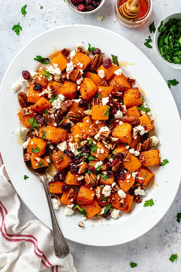 Roasted butternut squash with pecans, cranberries, feta & hot honey