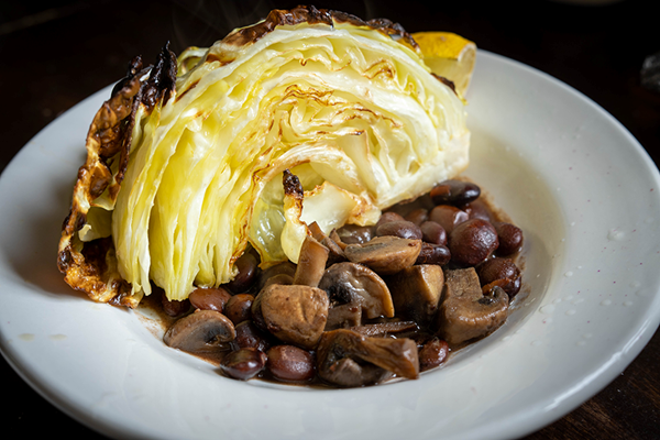 Roasted cabbage with beans and lemon