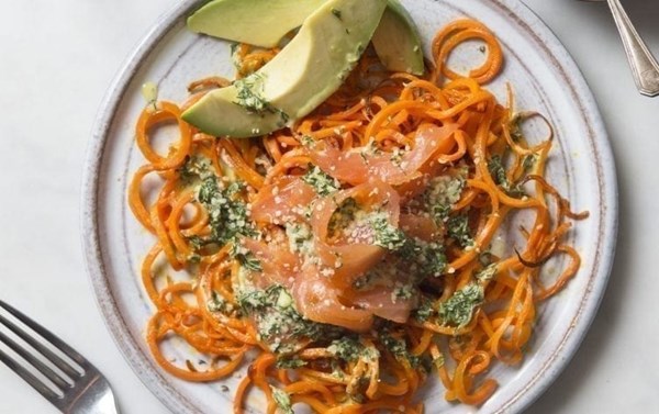 Roasted carrot noodles with smoked salmon, avocado, and creamy herb dressing