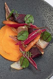 Roasted carrot, shallot & beetroot with carrot purée & chard