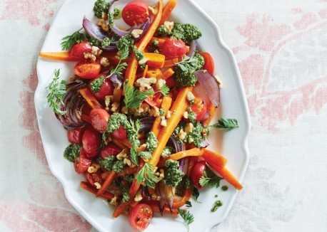 Roasted carrots and cherry tomatoes with carrot-top pesto dressing