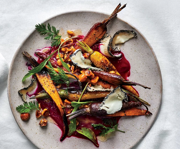 Roasted carrots with beet puree, goat cheese, and hazelnuts