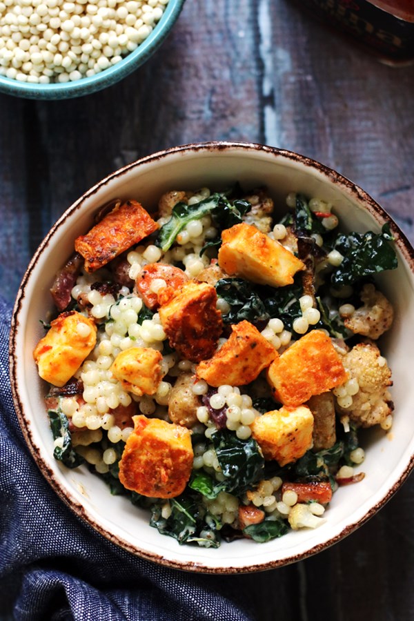 Roasted cauliflower and Israeli couscous salad with harissa-marinated halloumi