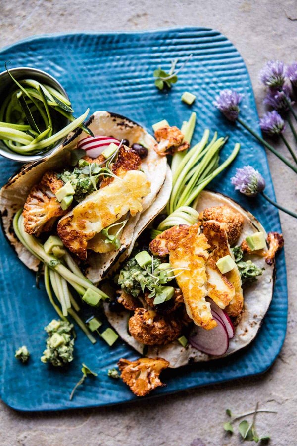 Roasted cauliflower fried halloumi tacos with spicy avocado basil guacamole