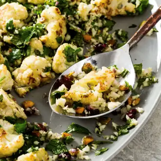 Roasted cauliflower salad with cranberries and pistachios
