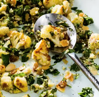 Roasted cauliflower salad with golden raisins and almonds