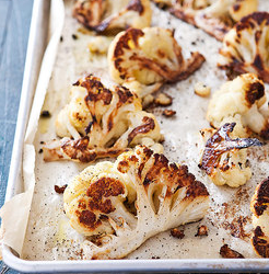 Roasted cauliflower with bacon and scallions
