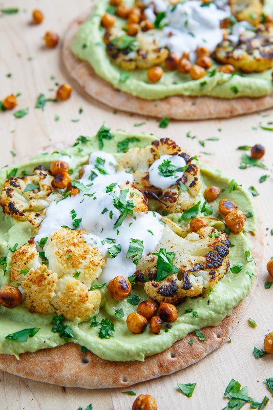 Roasted cauliflower with chickpea pitas and avocado hummus