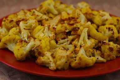 Roasted cauliflower with lemon, curry, and cumin