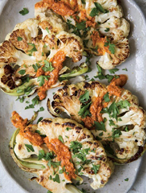 Roasted cauliflower with romesco sauce and a shower of parsley