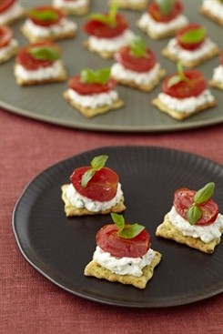 Roasted cherry tomatoes with basil ricotta