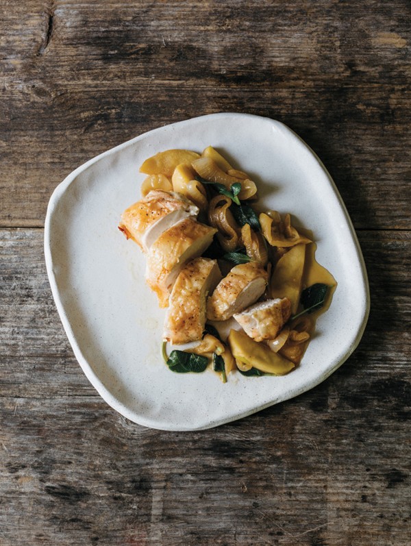 Roasted chicken breasts with apples, onions and sage