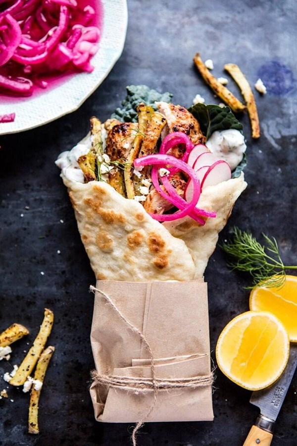 Roasted chicken gyros with tzatziki and feta fries