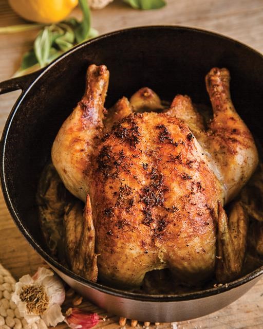 Roasted chicken in milk with lemons