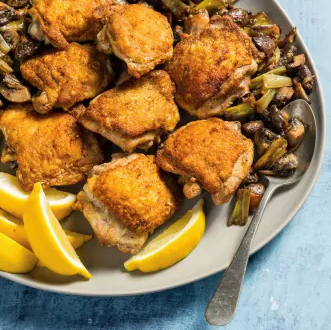 Roasted chicken thighs with buttered mushrooms and leeks