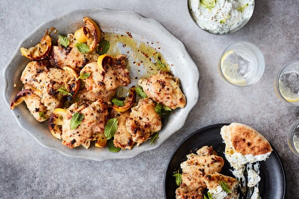 Roasted chicken thighs with garlicky cucumber yogurt