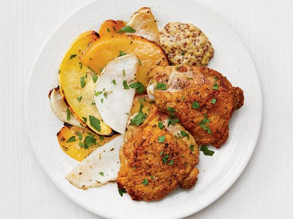 Roasted chicken thighs with root vegetables 