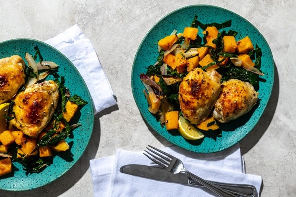 Roasted chicken with butternut squash and kale