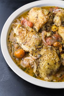 Roasted chicken with herbs and tomatoes