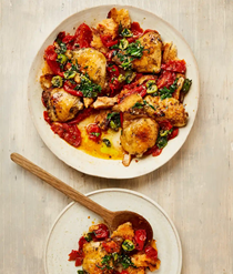 Roasted chicken with tomatoes, bread and herbs