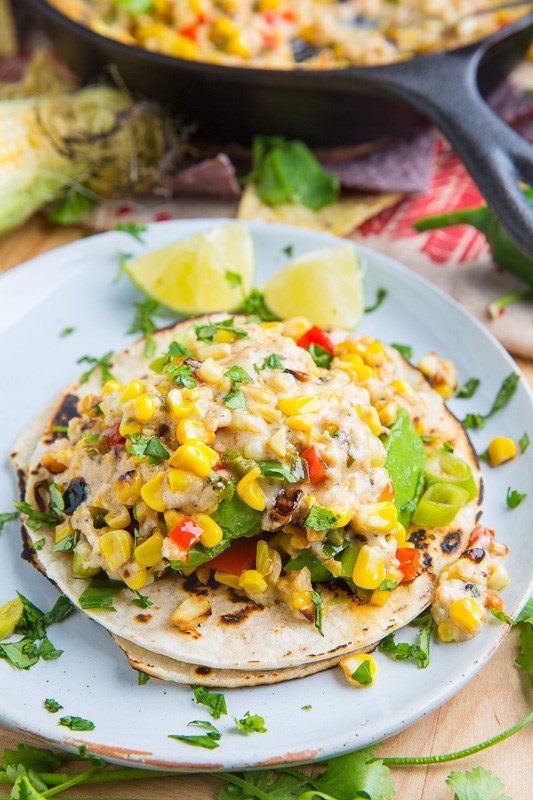 Roasted corn queso fundido and avocado tacos