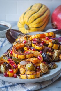Roasted delicata squash and Brussels sprouts with pomegranate agrodolce 
