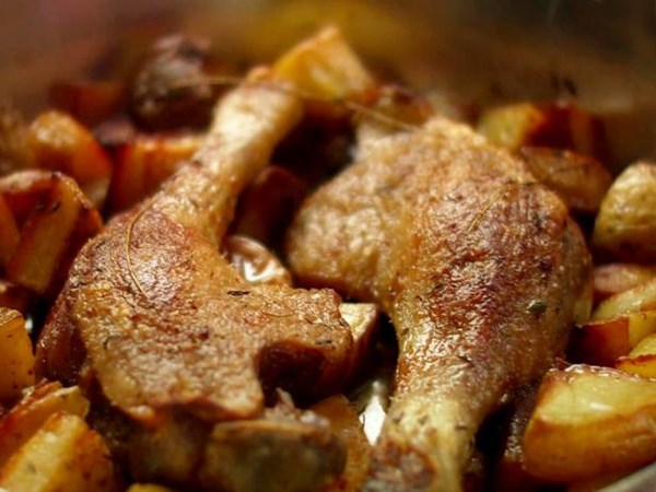 Roasted duck legs and potatoes