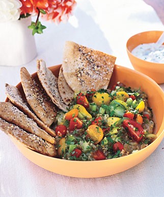 Roasted eggplant salad with pita chips and yogurt sauce