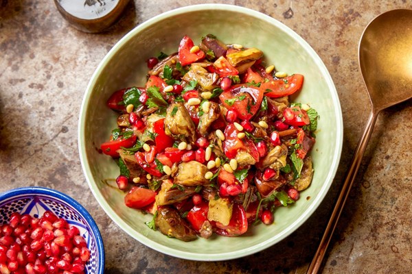 Roasted eggplant salad with tomatoes and pine nuts