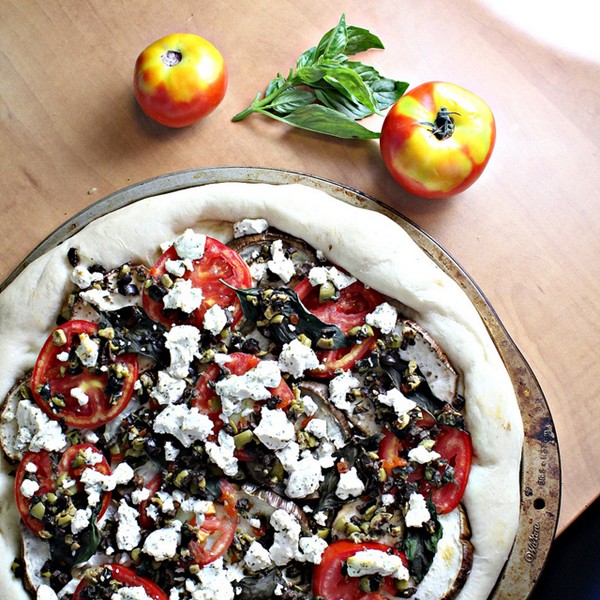Roasted eggplant, tomato and tapenade pizza with goat cheese