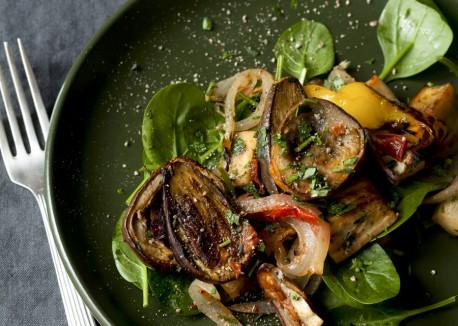 Roasted eggplant with bell peppers, tomatoes, and herbs