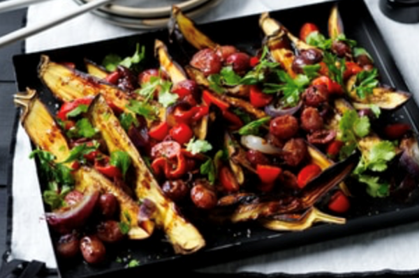 Roasted eggplant with sticky tomato, capsicum and grapes