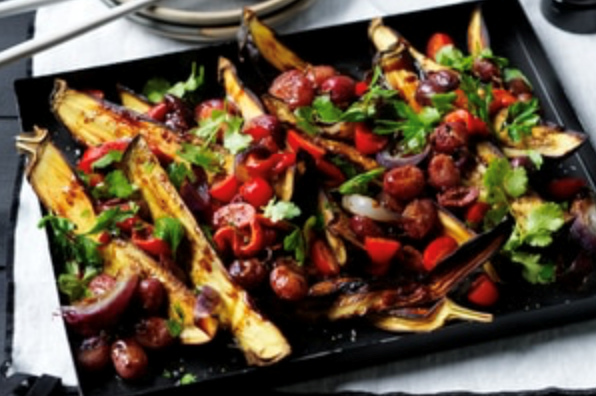 Roasted eggplant with sticky tomato, capsicum and grapes
