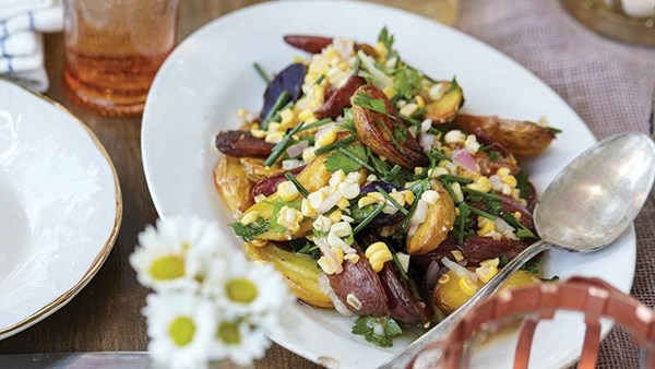 Roasted fingerling potatoes with corn-garlic chive vinaigrette