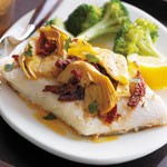 Roasted fish with artichokes and sun-dried tomatoes