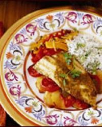 Roasted fish with charmoula, tomatoes and potatoes