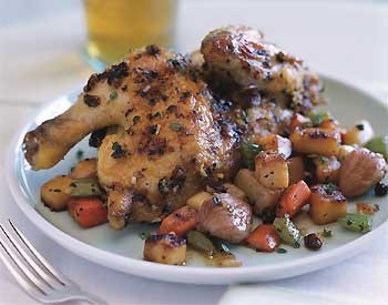 Roasted game hens with caramelized root vegetables and dried-currant sauce