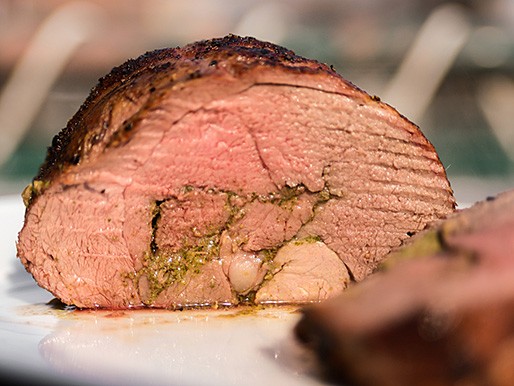 Roasted garlic and mint pesto stuffed leg of lamb