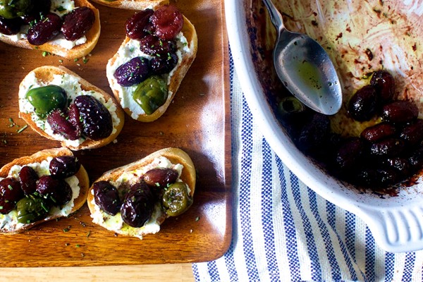 Roasted grape and olive crostini
