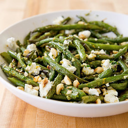 Roasted green beans with goat cheese and hazelnuts