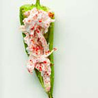 Roasted green chillies stuffed with paprika chicken