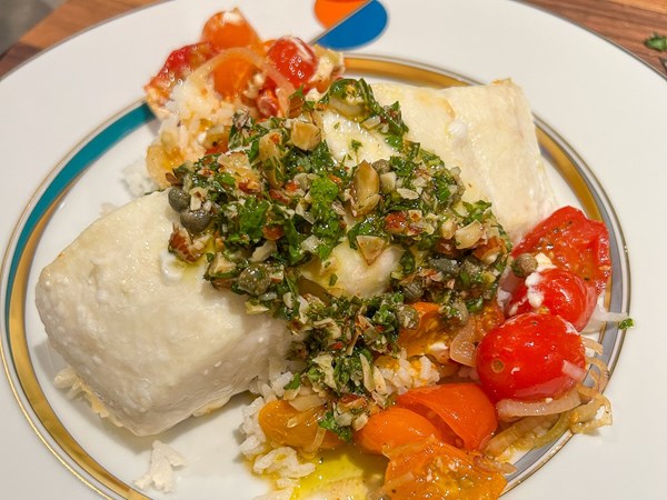 Roasted halibut with burst cherry tomatoes and salsa verde