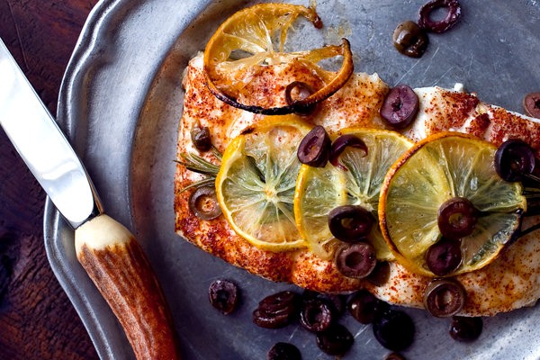 Roasted halibut with lemons, olives and rosemary