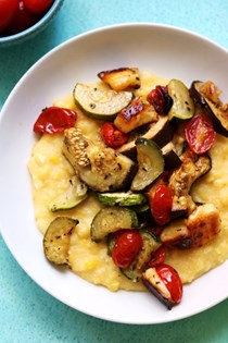Roasted halloumi and summer vegetable bake with fresh corn polenta