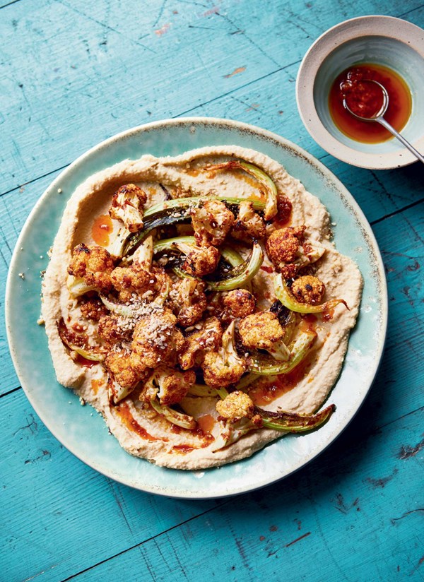 Roasted harissa cauliflower with warm hummus and za'atar